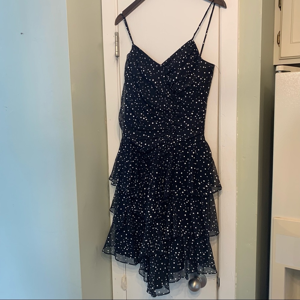 Gorgeous spaghetti strap dress with lace up back and tiered skirt. Vintage!